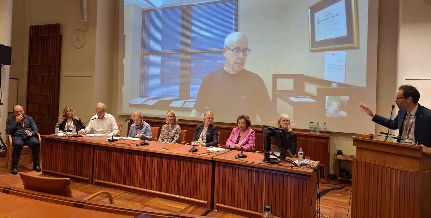 Panelists at the symposium