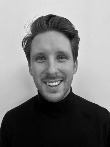 Blacj and white headshot of doctoral student André Thunberg