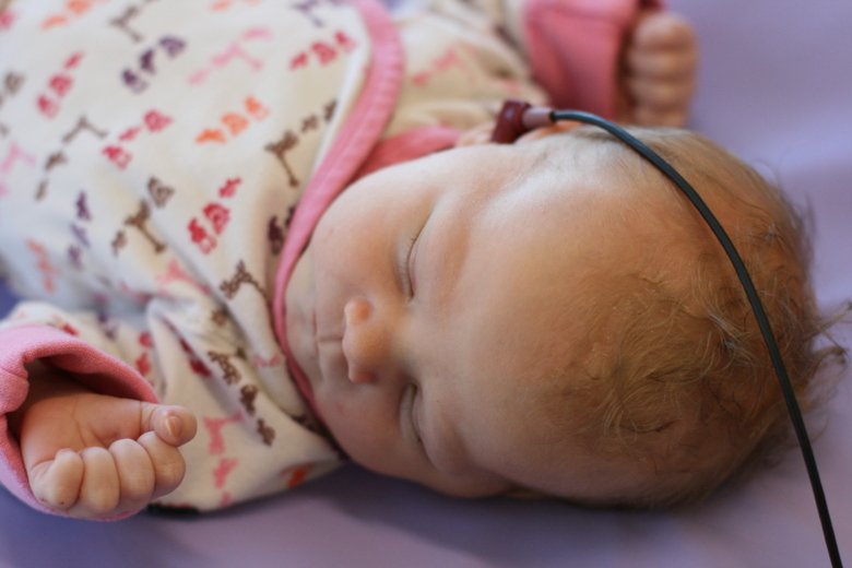 Allison Mackey's daughter Elise having her hearing screening.