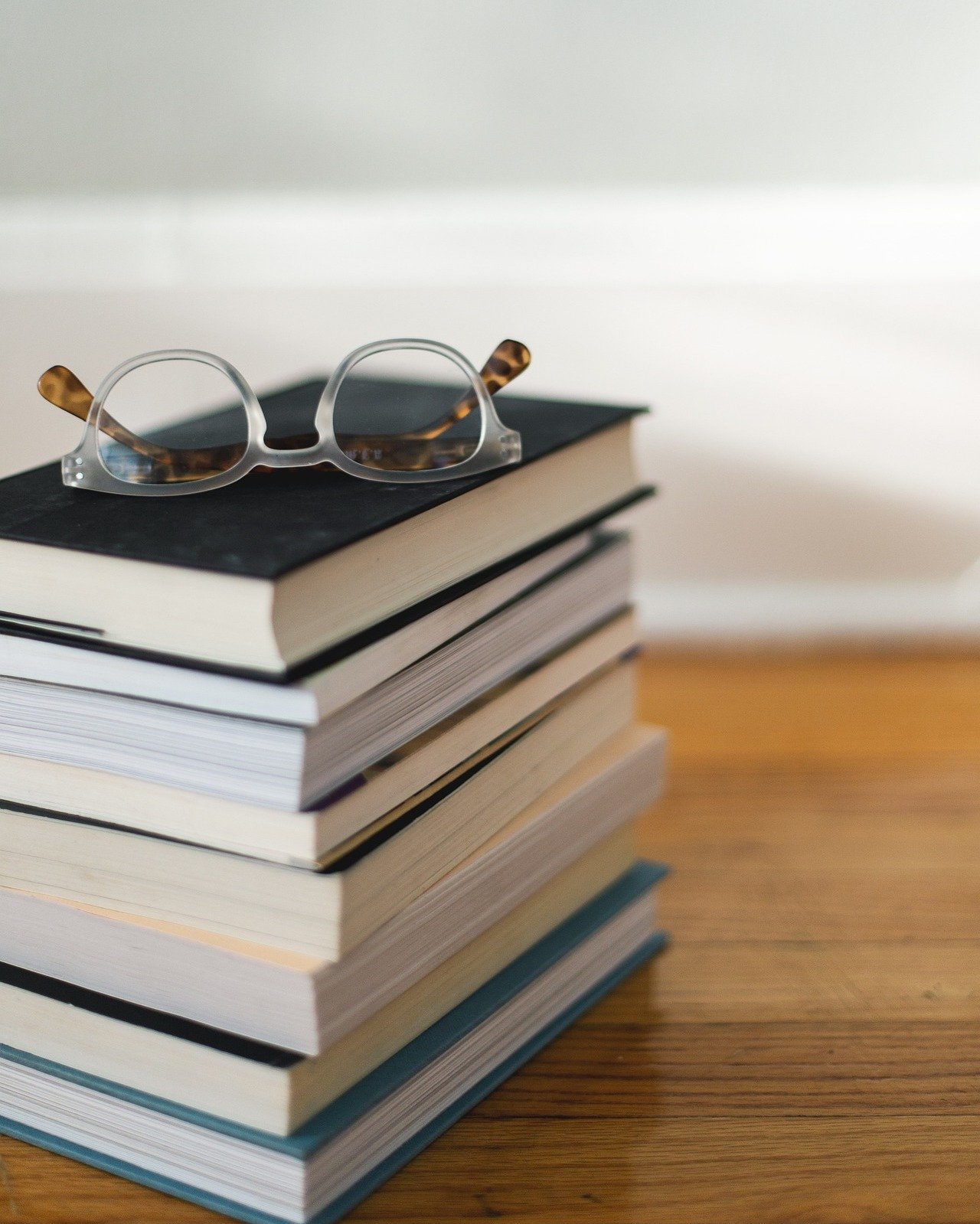 Books and a pair of glasses