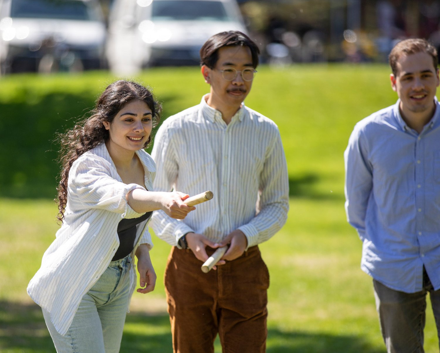 Students outside at campus Solna during a sunny spring day in 2022.