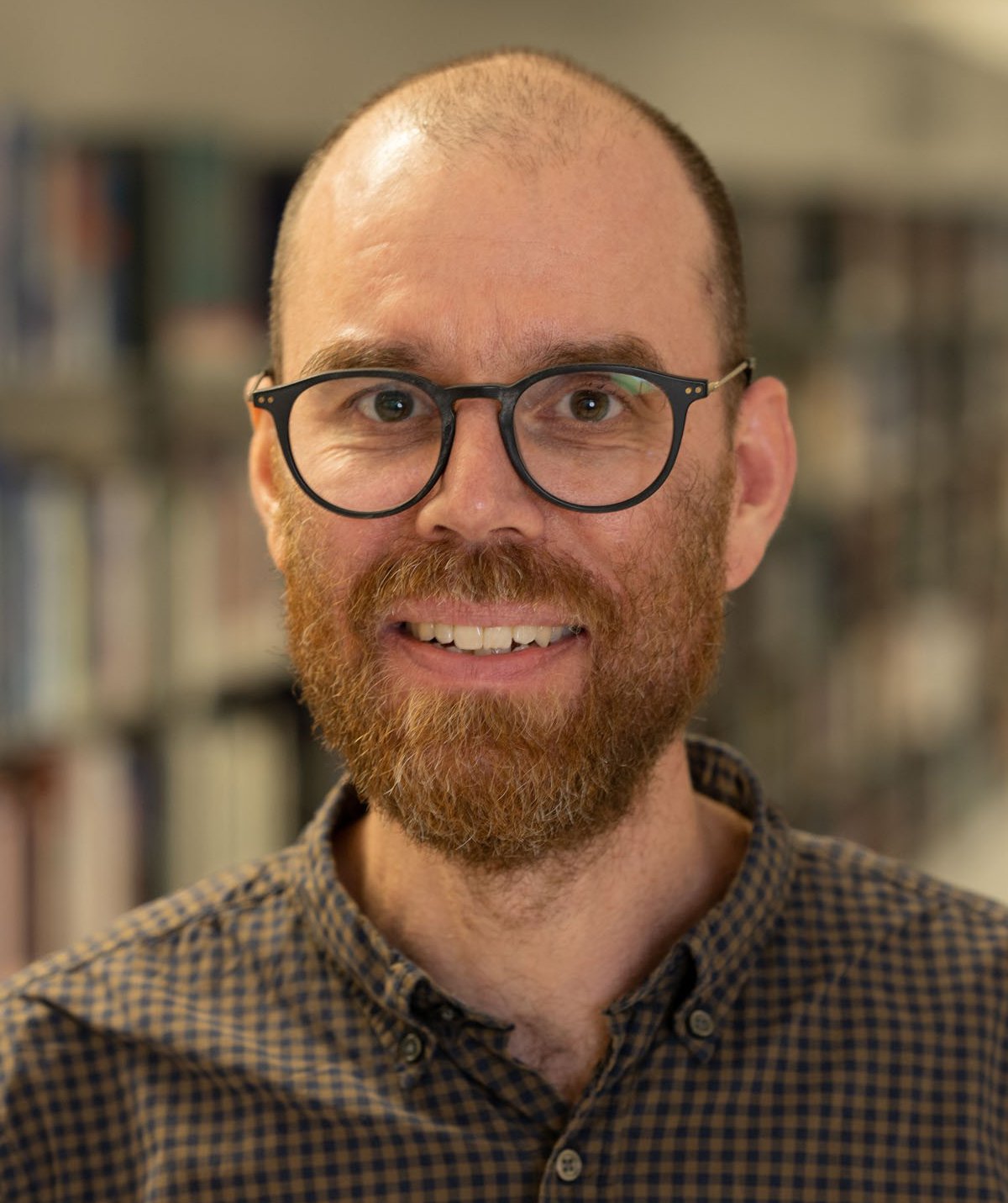 Portrait of Erik at the library.