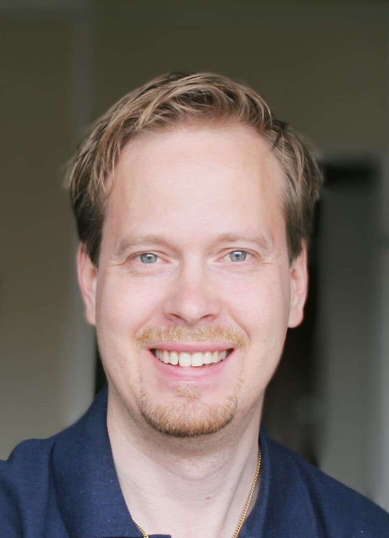 Portrait of PhD student Mikael Eriksson