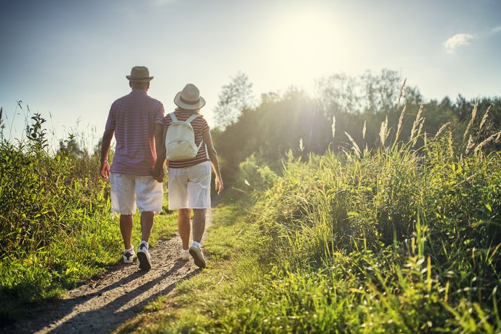 Man and woman walking on a beautiful summer night.