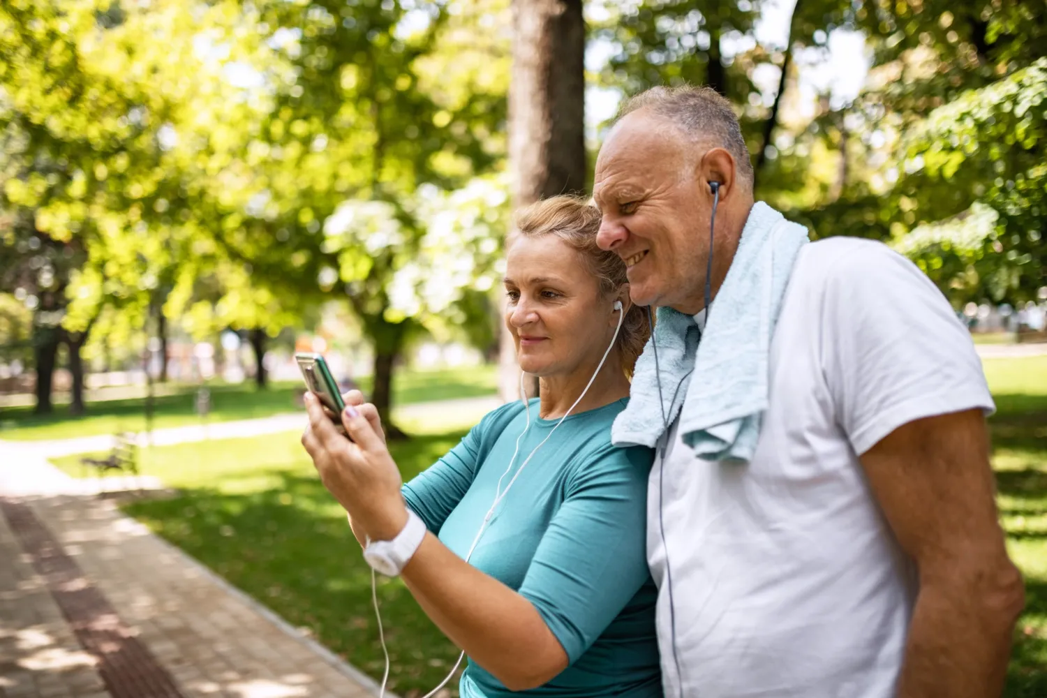 Woman and man looking at phone