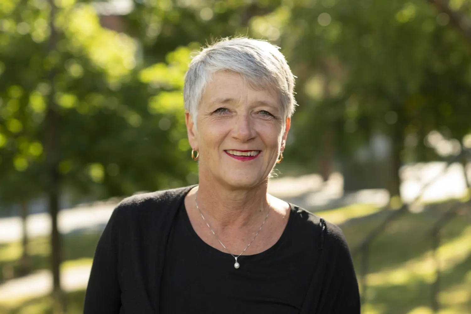 Portrait of Susanne Guidetti in a park in summer.