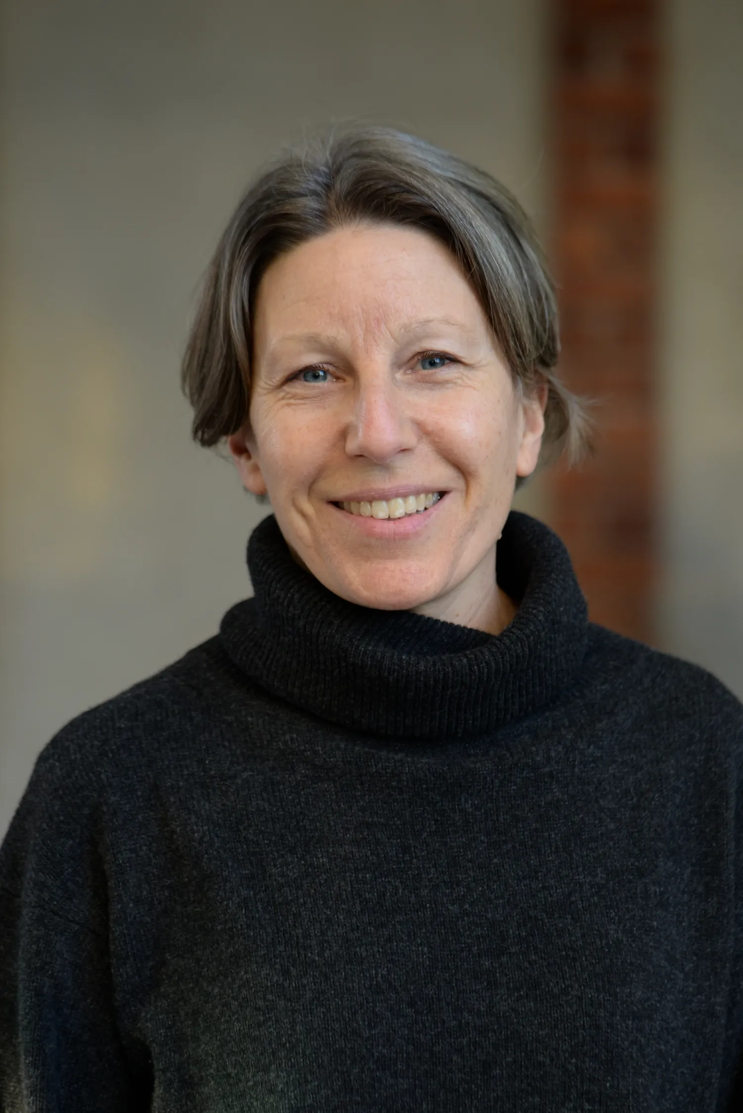 Profile photo of Helena Hervius Askling, a woman with short grey hair and a black jumper || Helena Hervius Askling