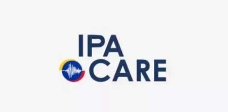 Logotype for the project IPA Care. Name in blue and a circle in blue, red and yellow