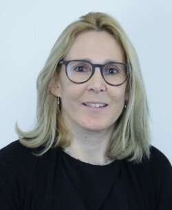 Woman looking into camera.