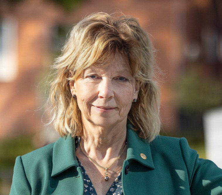 Business dressed woman outside