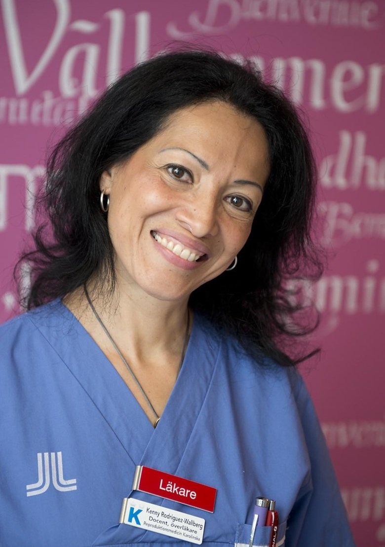 Portrait of Kenny Rodriguez-Wallberg in her doctor's coat