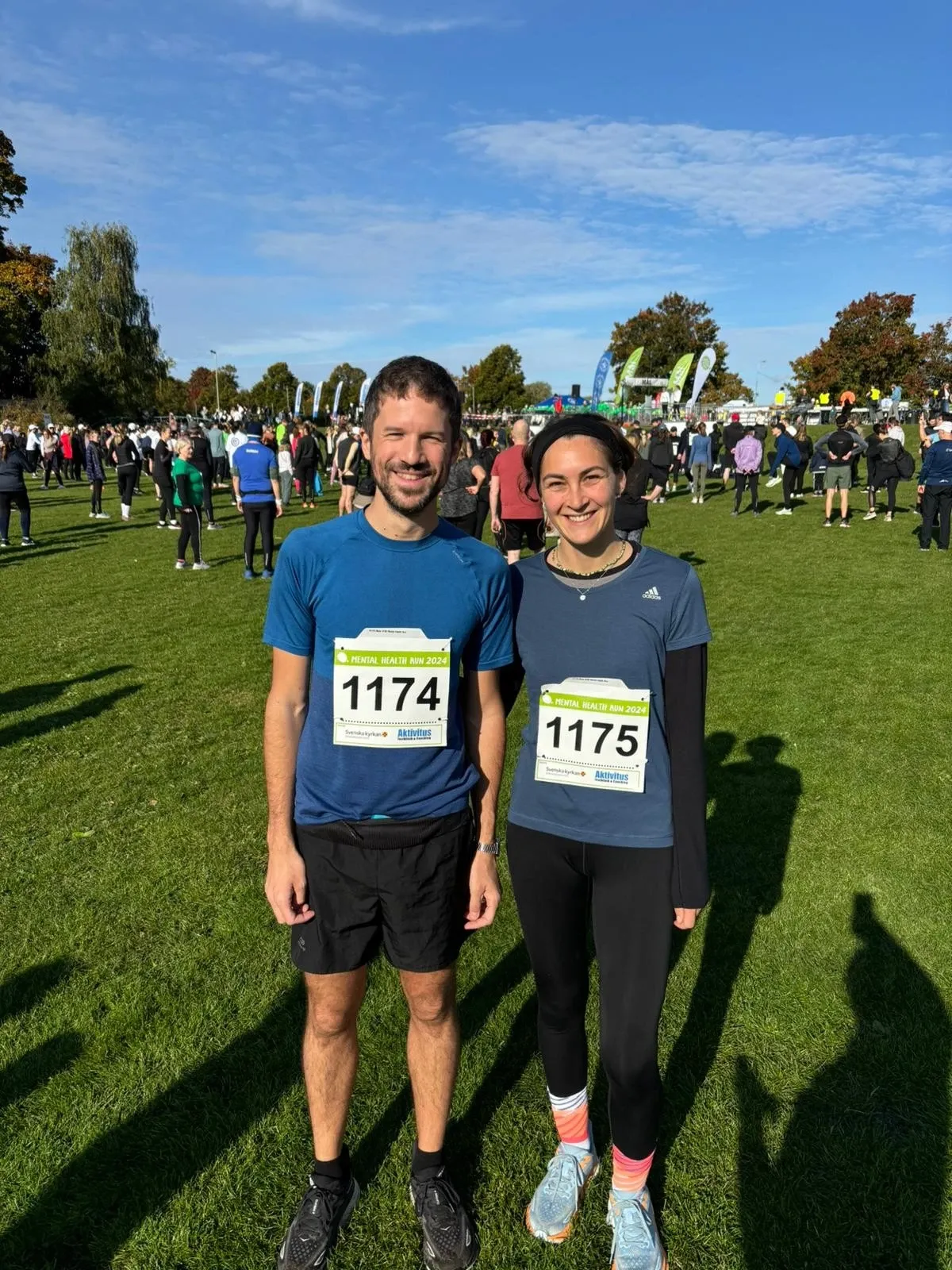 Franziska Steffens and Federico Triolo, standing in the sun at Djurgården.