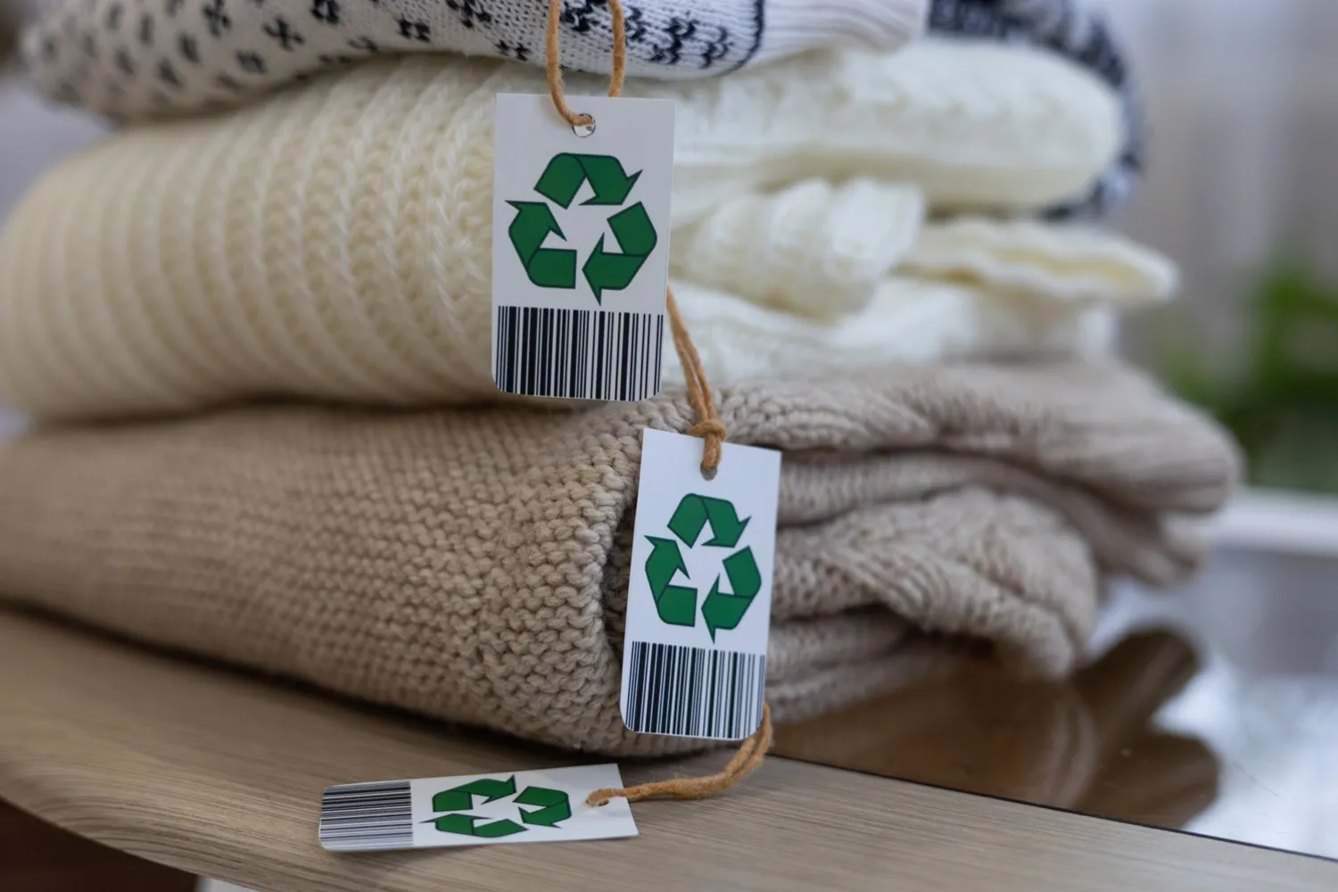 Folded recycled woolen clothing