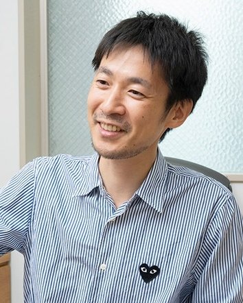 A portrait of a man looking away.