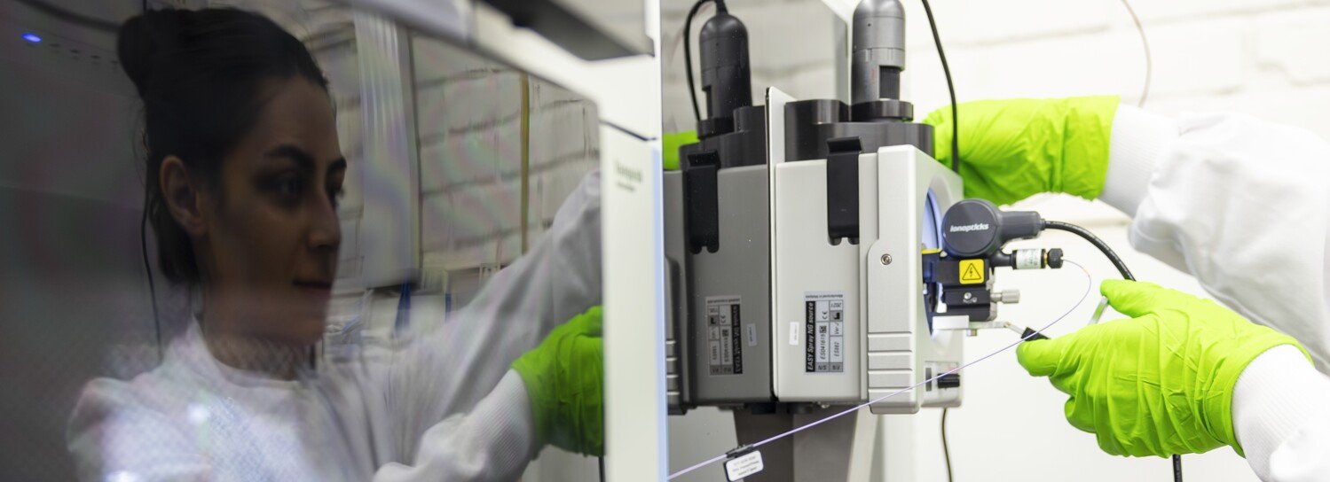 Researcher attending to the equipment.