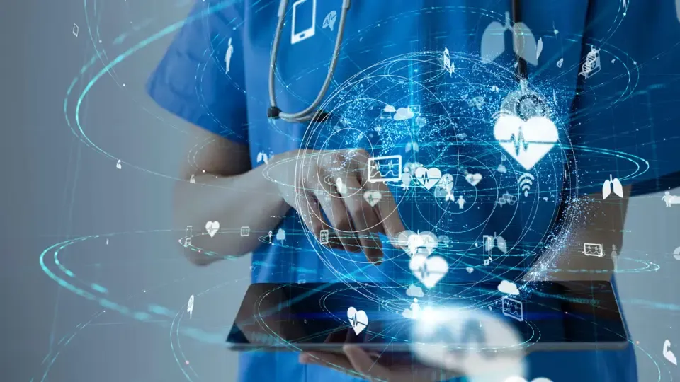 Blue tinted picture of woman on laptop. Over the whole picture there are symbols on display.
