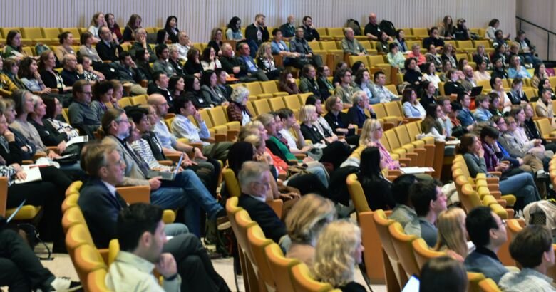 Participants sitting in Aula Medica.