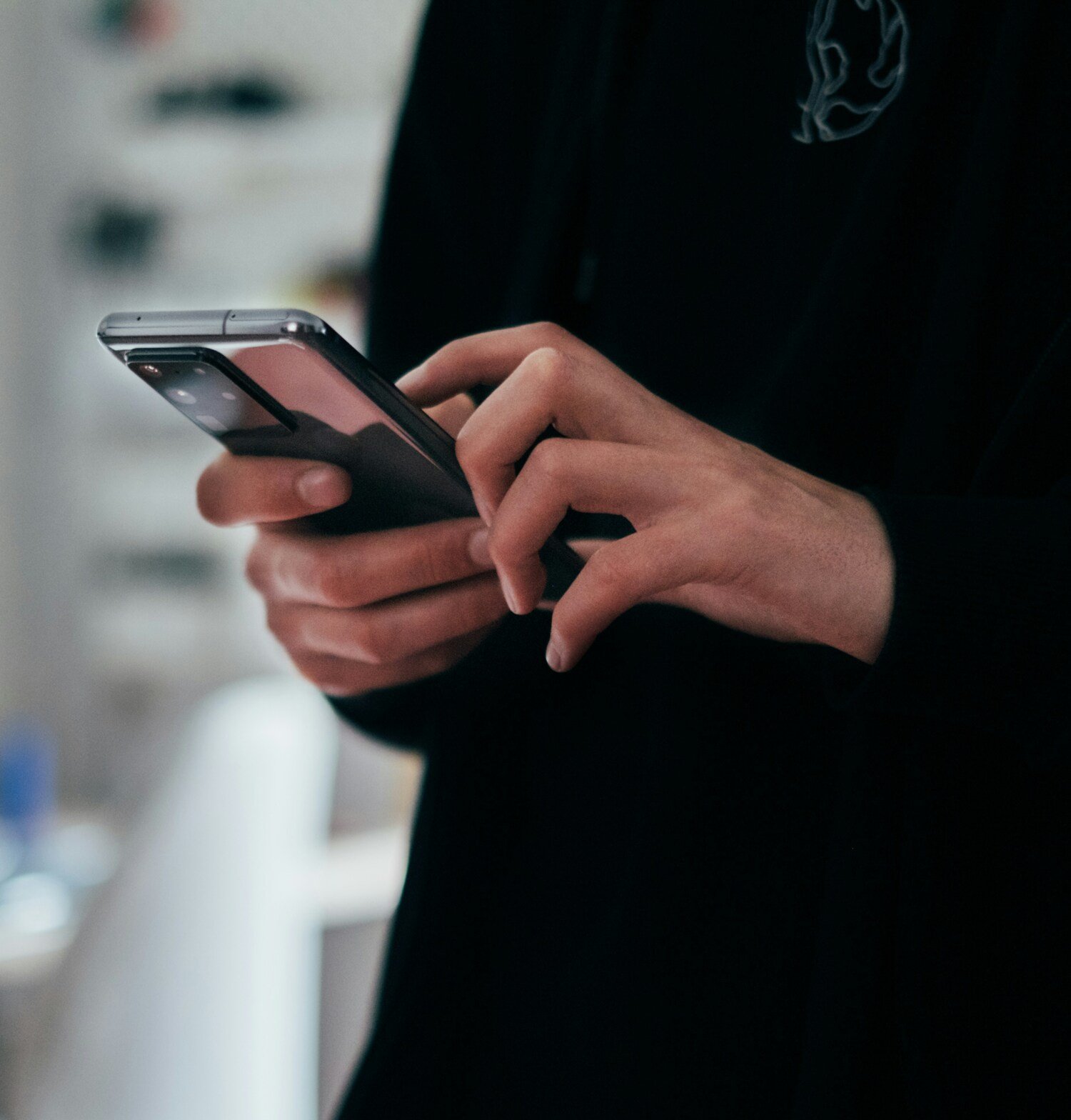 person holding black android smartphone