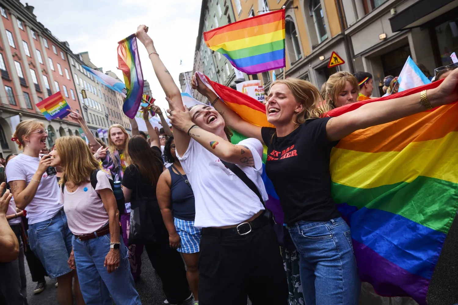 Rebecca Angelif and Lisa Risberg dancing during the Pride Parade.