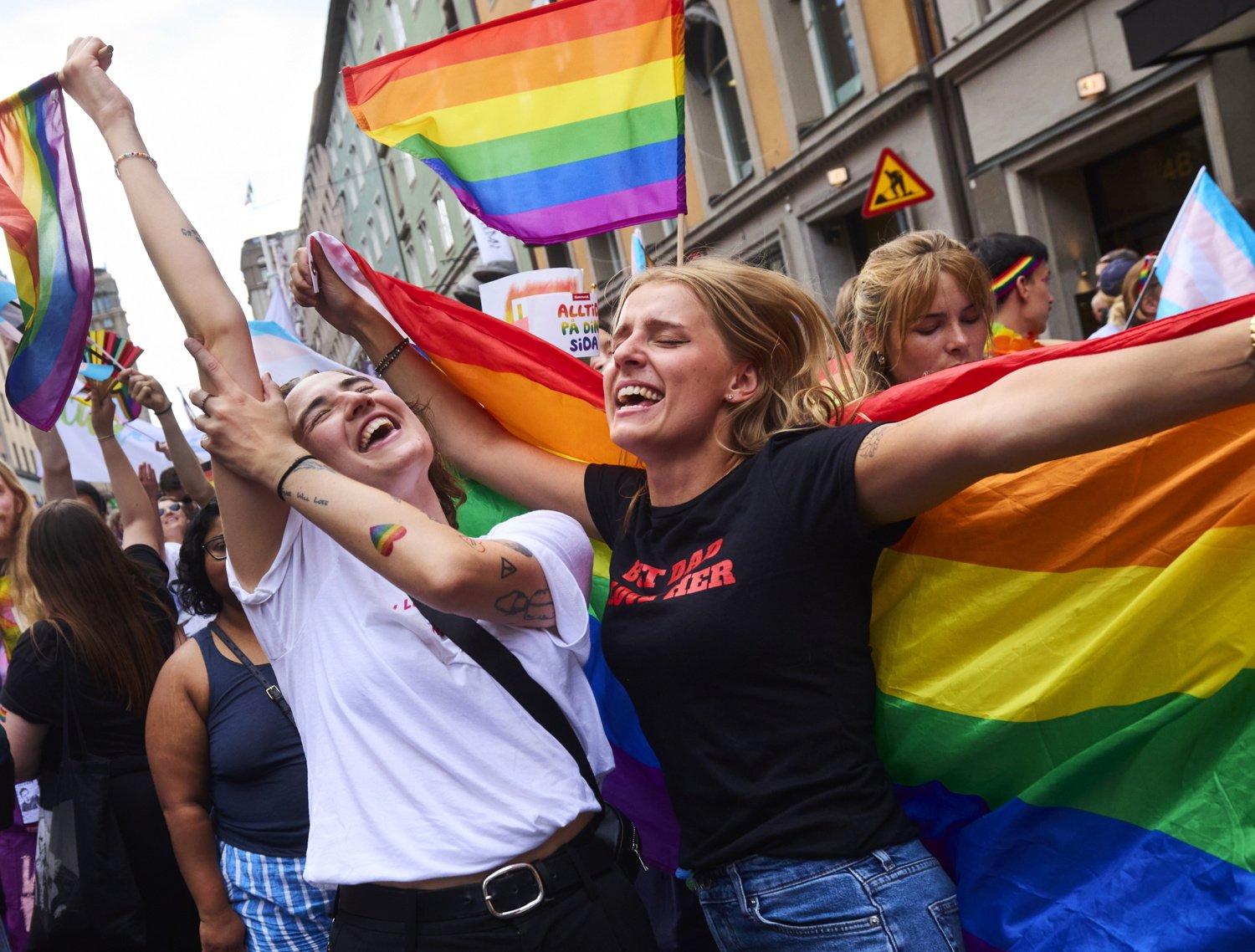 Rebecca Angelif and Lisa Risberg dancing during the Pride Parade.