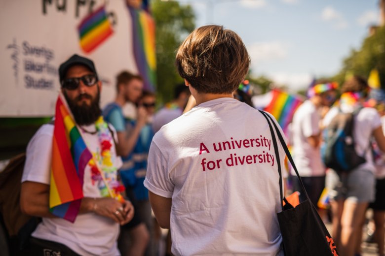 Colorful images of happy people, pride flags and a sunny sky.