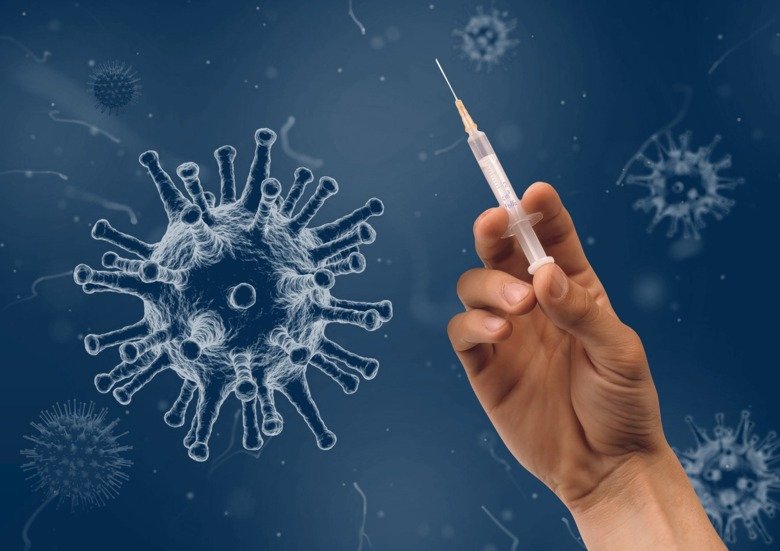 Illustration of virus, DNA and syringe - illustrating the new vaccines against the coronavirus.