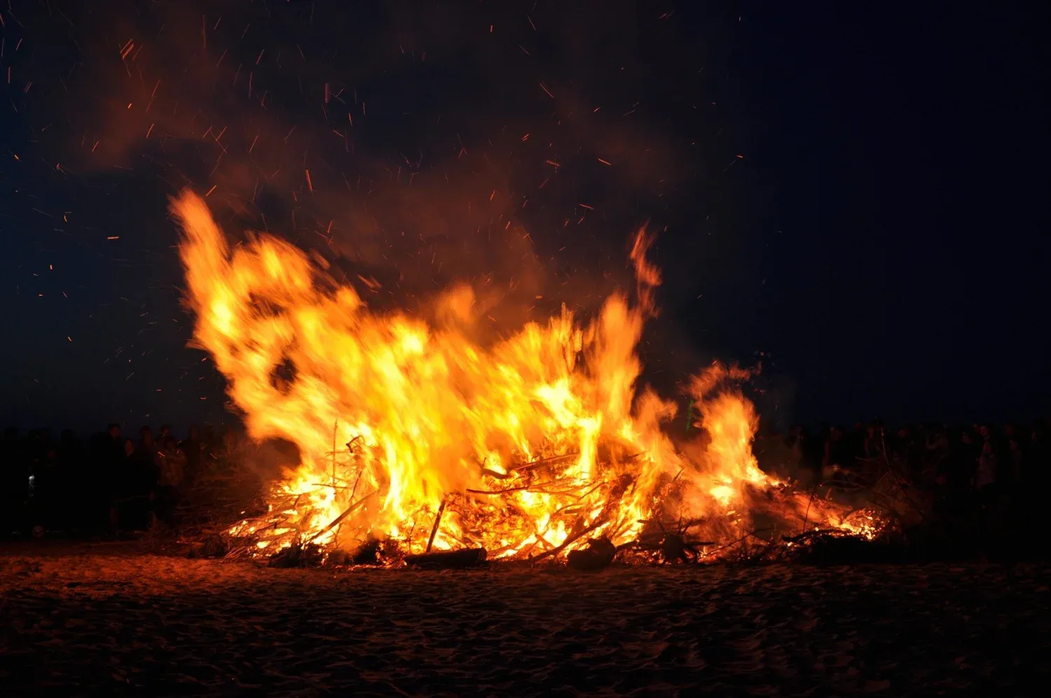 Fire whose flames blow in the dark