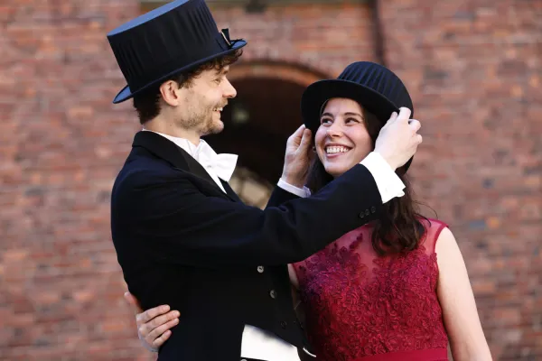 Nils Hentati Isacsson and Amira Hentati embrace each other during the conferment ceremony.