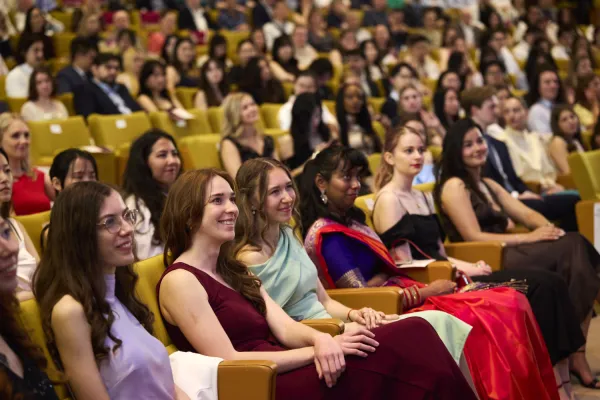 The graduates are waiting to go on stage to receive their good wishes from the KI´s President.