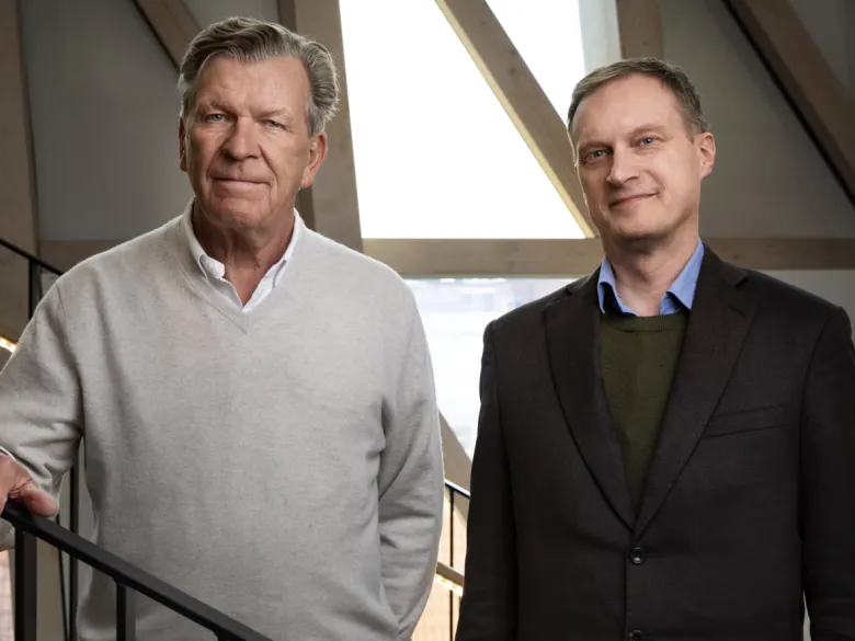 (Left) Mats Arnhög and Sten Linnarsson in KI's Aula Medica.