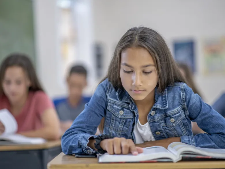 Portrait of girl reading