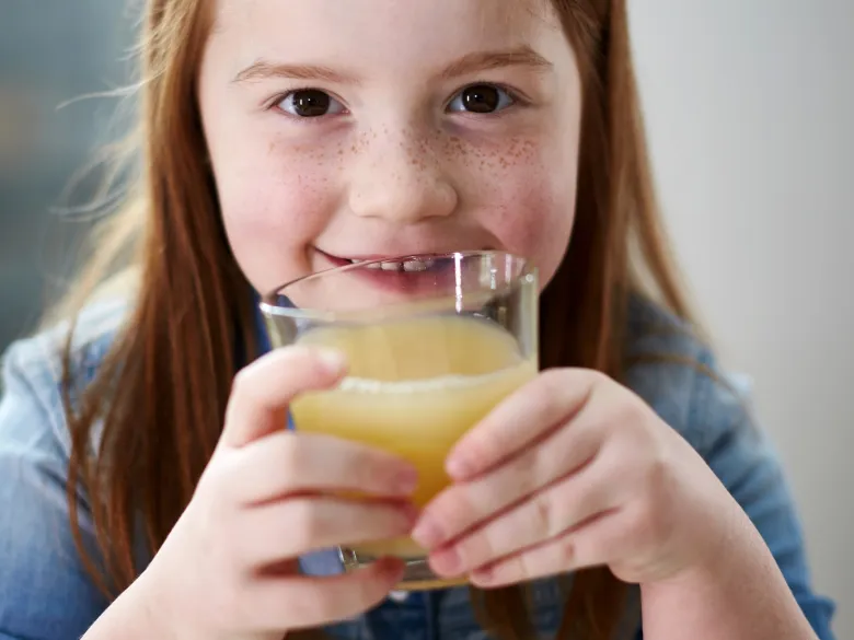 Child drinking juice.