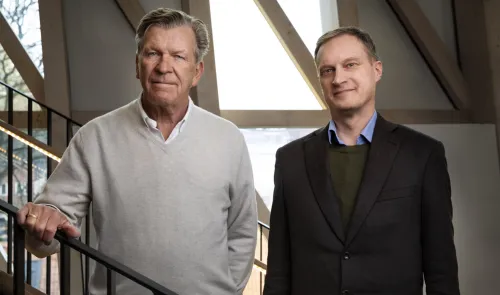 (Left) Mats Arnhög and Sten Linnarsson in KI's Aula Medica.