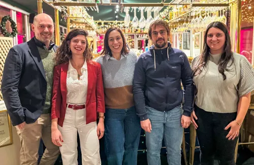 Group picture of research group leaders and PhD students in their laboratories.