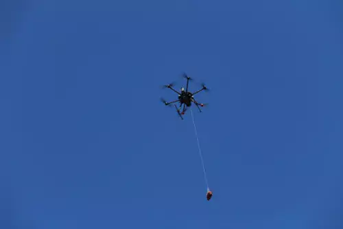 Photo of drone delivering a defibrillator
