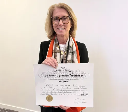 Portrait of researcher with Diploma