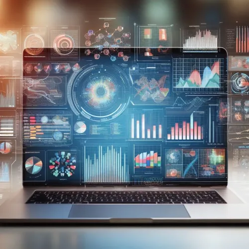 Decorative image of an open computer showing charts and tables.