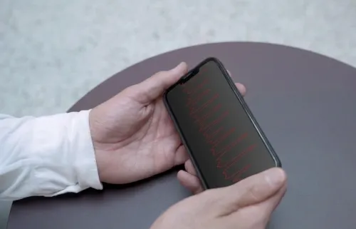 Monitoring a person's heart rhythm using a mobile phone