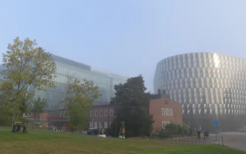 The picture shows buildings on Campus Solna in morning fog.