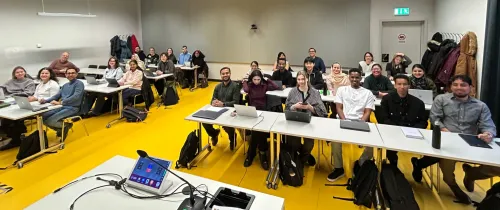 Students sitting in a classroom.