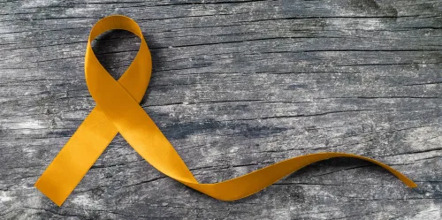 A golden ribbon against childhood cancers.