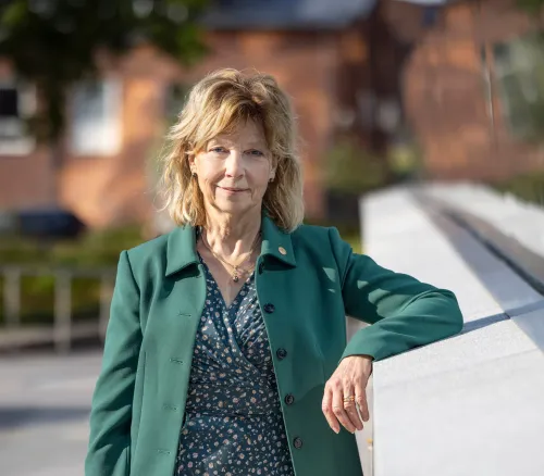 Business dressed woman outside