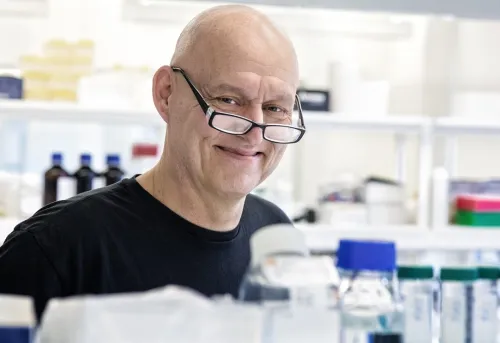Pär Nordlund wearing glasses and smiles.