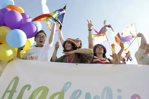 Students and staff participated in the Pride Parade 2022 waving flags through the streets of Stockholm.