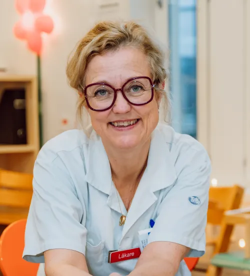 a woman in glasses