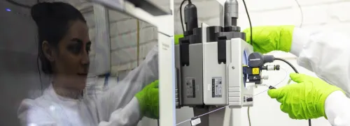 Researcher attending to the equipment.